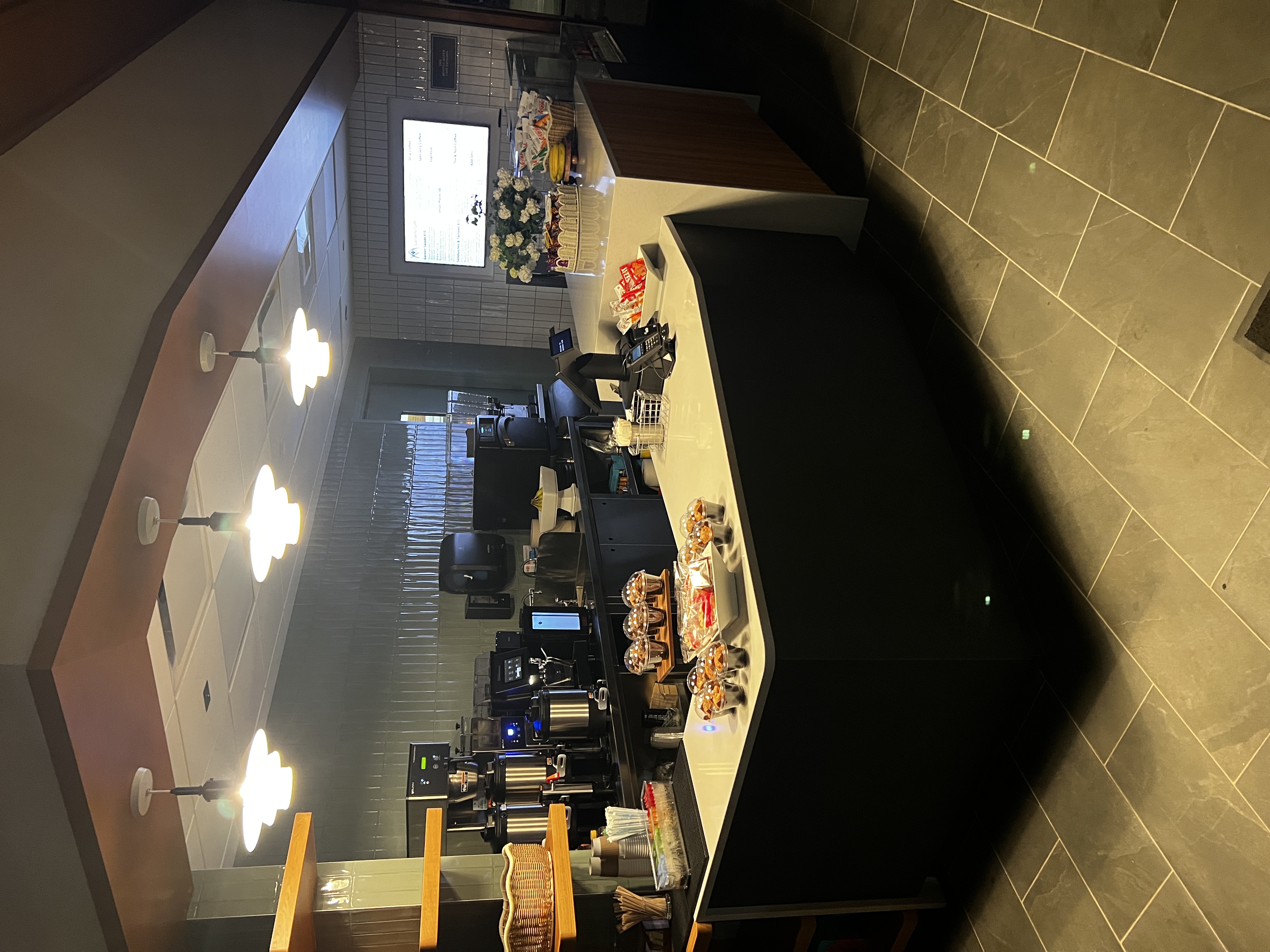 Gardens Café counter with coffee station and grab-and-go items