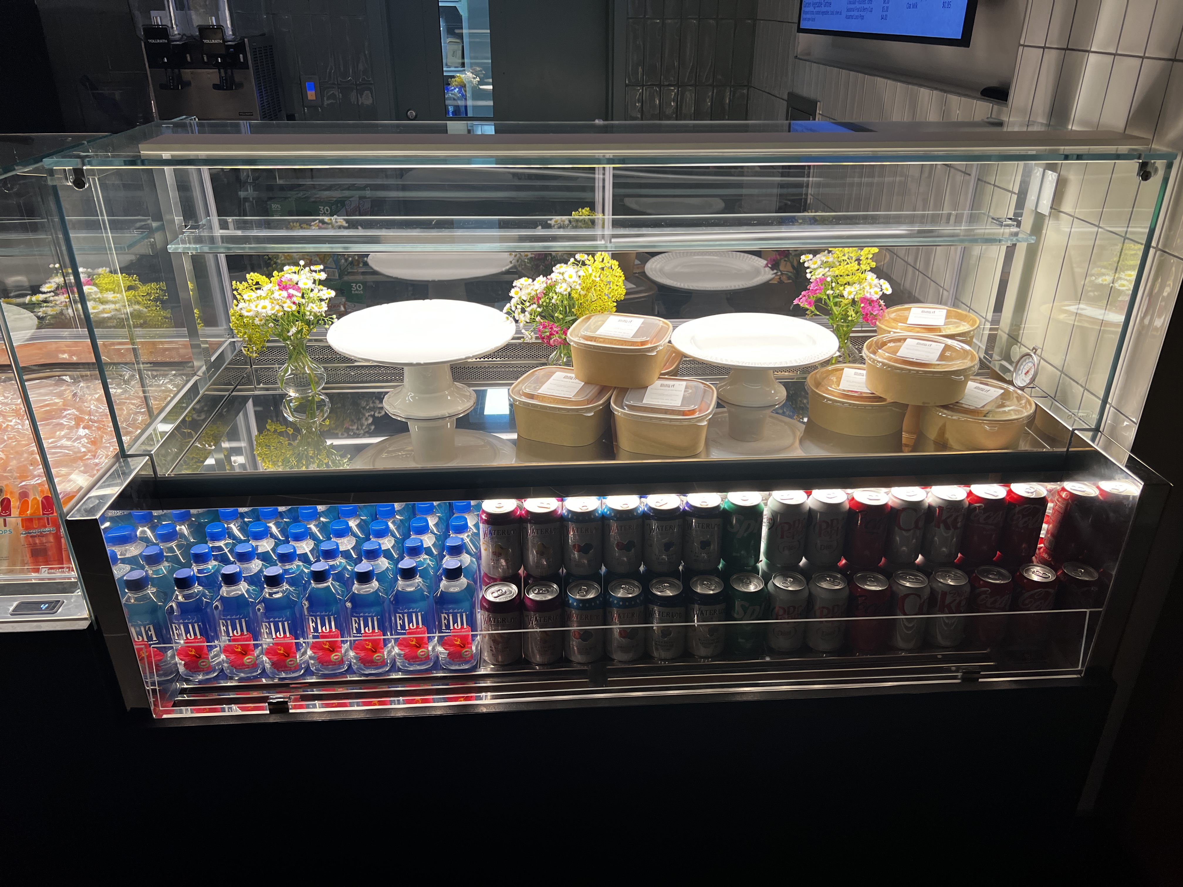 Gardens Café grab-and-go case with fresh items and cold beverages